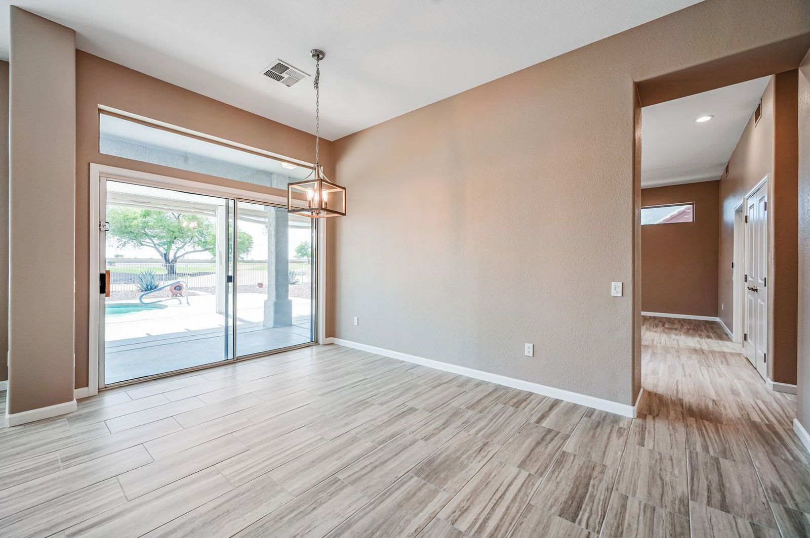 BEAUTIFUL REMODELED HOME WITH POOL AND BACKS GOLF COURSE - available mid April property image