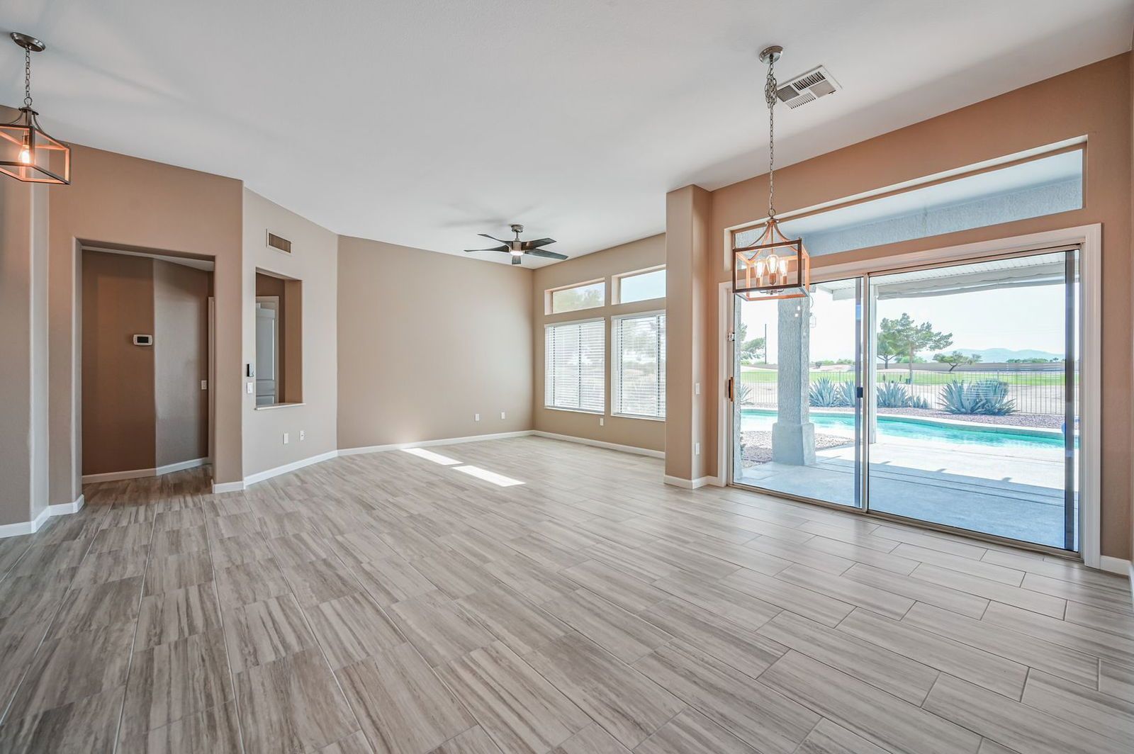 BEAUTIFUL REMODELED HOME WITH POOL AND BACKS GOLF COURSE - available mid April property image