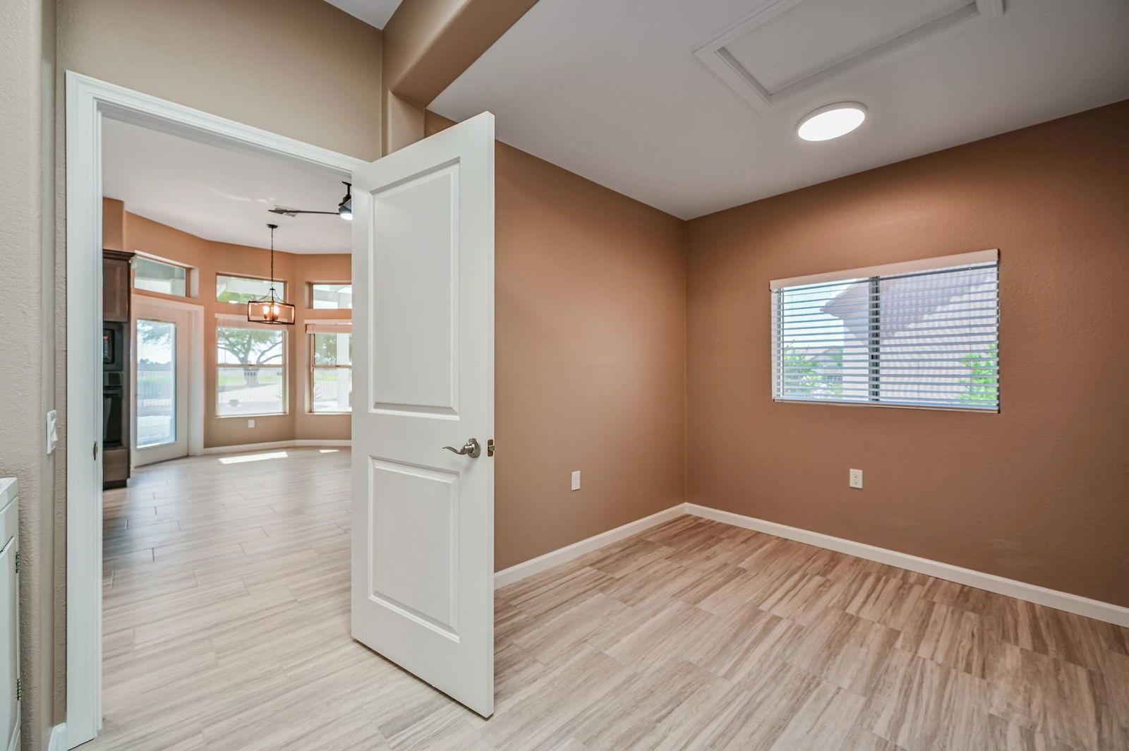 BEAUTIFUL REMODELED HOME WITH POOL AND BACKS GOLF COURSE - available mid April property image