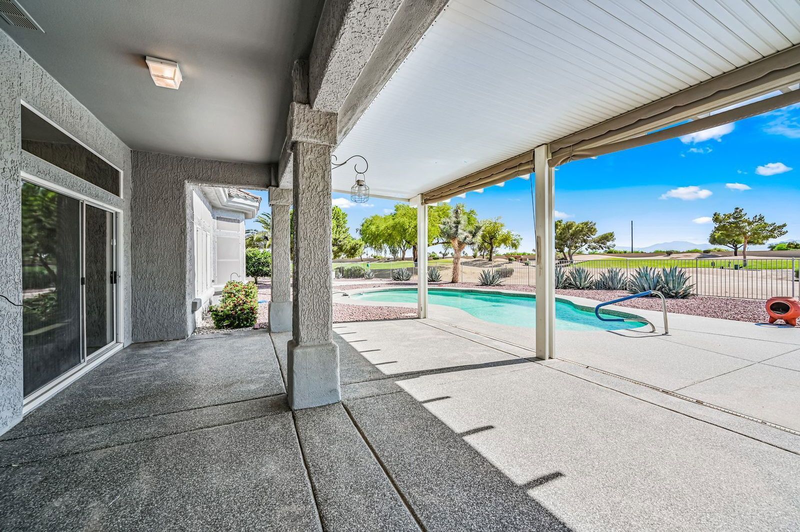 BEAUTIFUL REMODELED HOME WITH POOL AND BACKS GOLF COURSE - available mid April property image