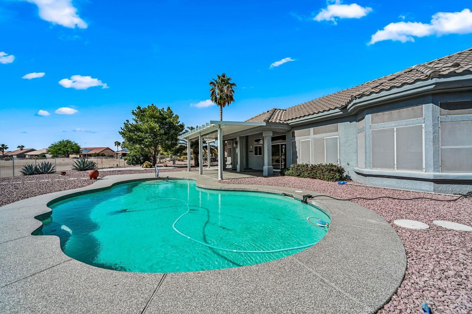 BEAUTIFUL REMODELED HOME WITH POOL AND BACKS GOLF COURSE - available mid April property image
