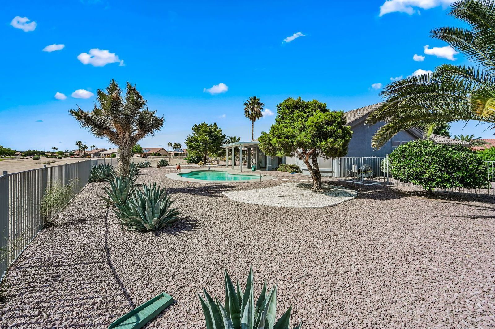 BEAUTIFUL REMODELED HOME WITH POOL AND BACKS GOLF COURSE - available mid April property image