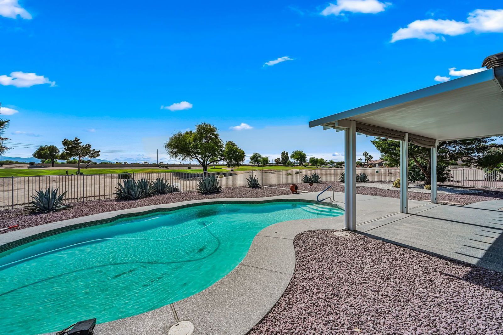 BEAUTIFUL REMODELED HOME WITH POOL AND BACKS GOLF COURSE - available mid April property image