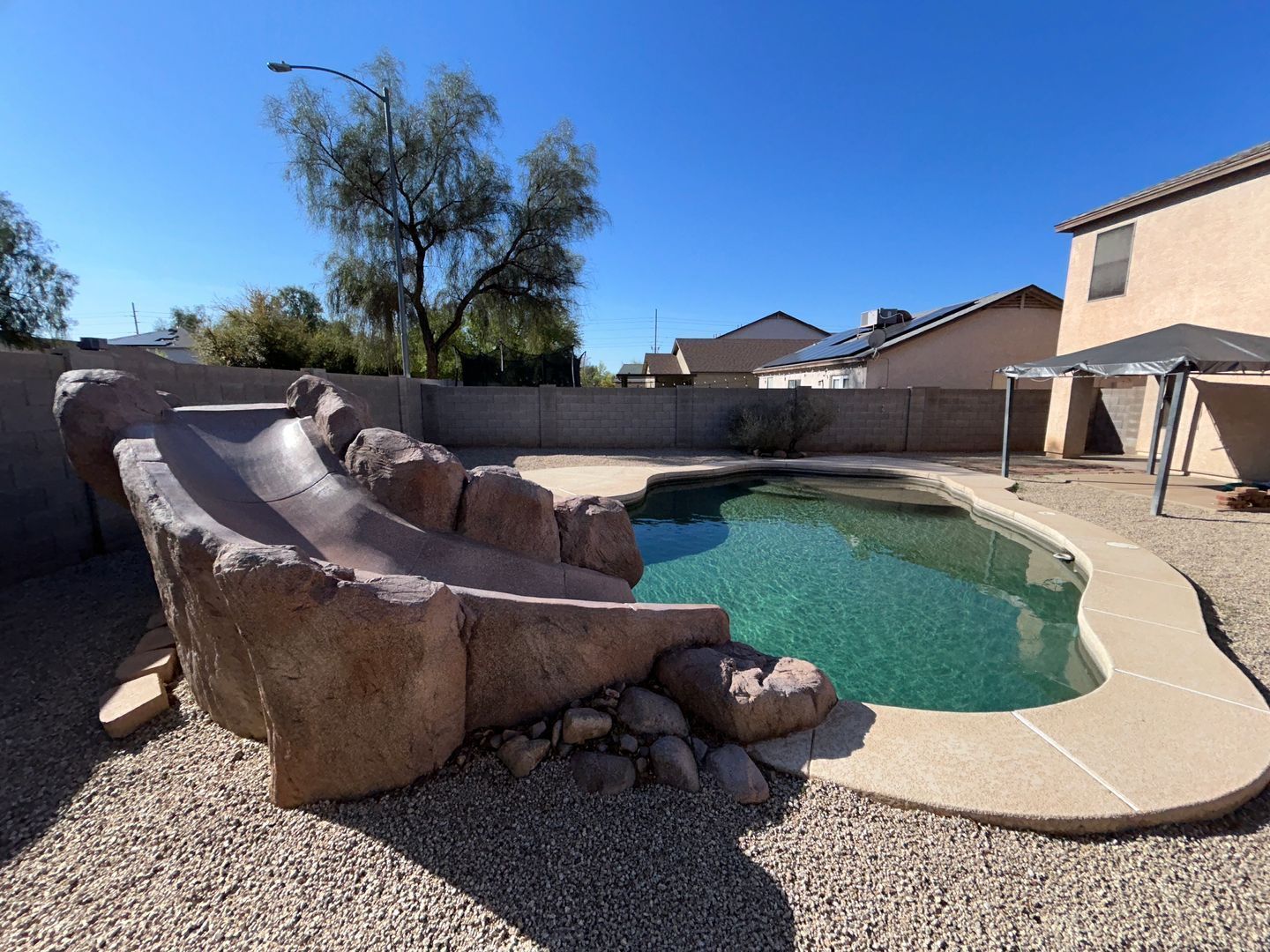 Updated 3 bedroom / 2.5 bathroom home WITH POOL/WATERFALL/SLIDE ready for immediate move-in property image