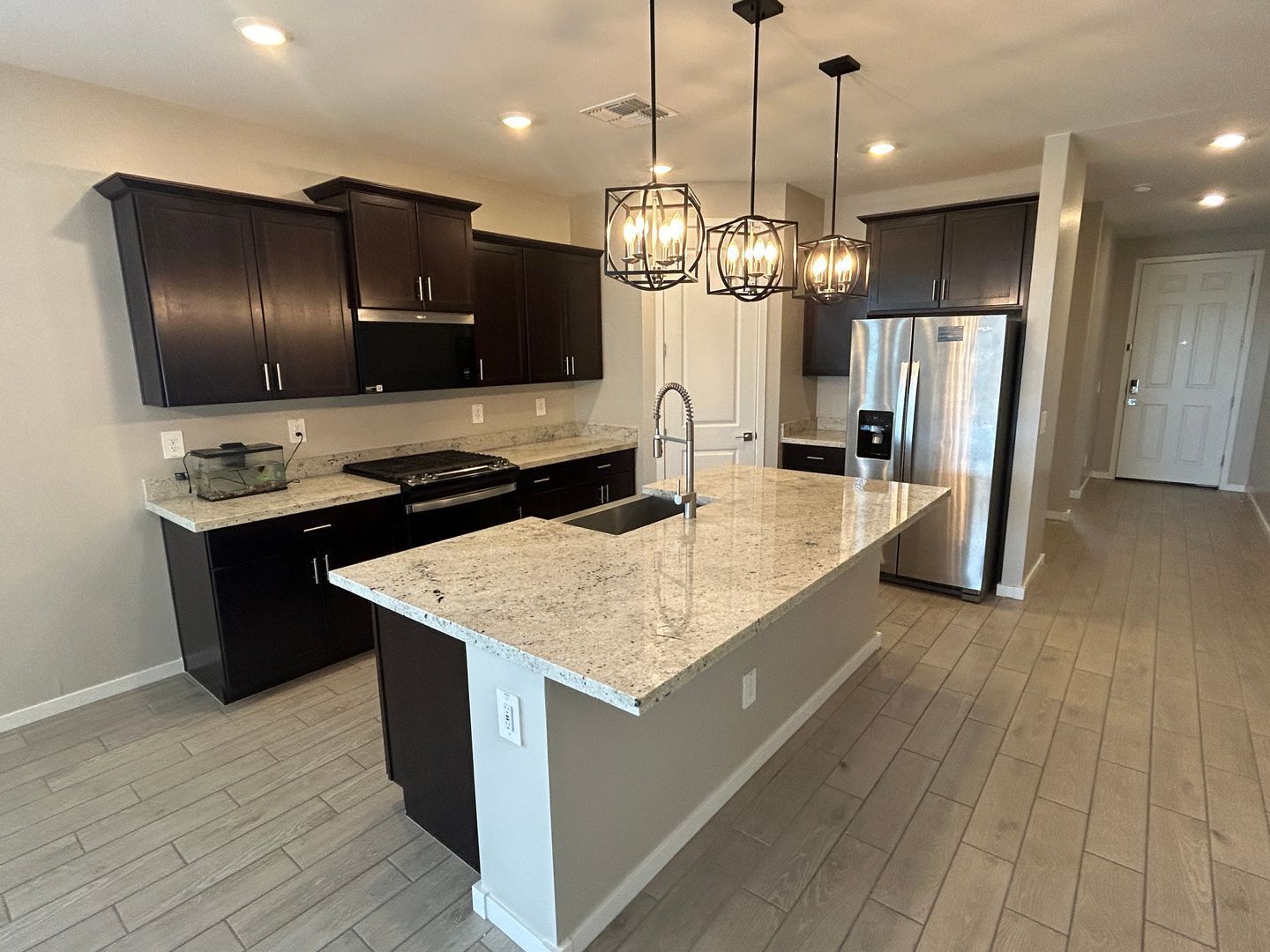 4 bedrooms (plus den), 3 bathrooms in a gated community (Enclave at Olive) ready for immediate move-in property image