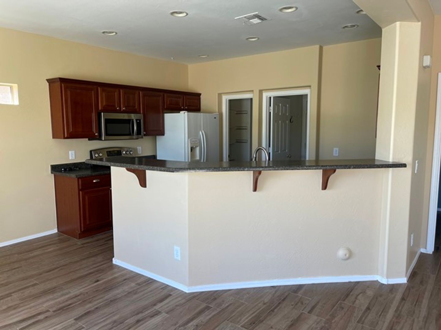 3 bedroom and 2 1/2 bath home with a pool and spa in Surprise Farms is ready for early July move in! property image