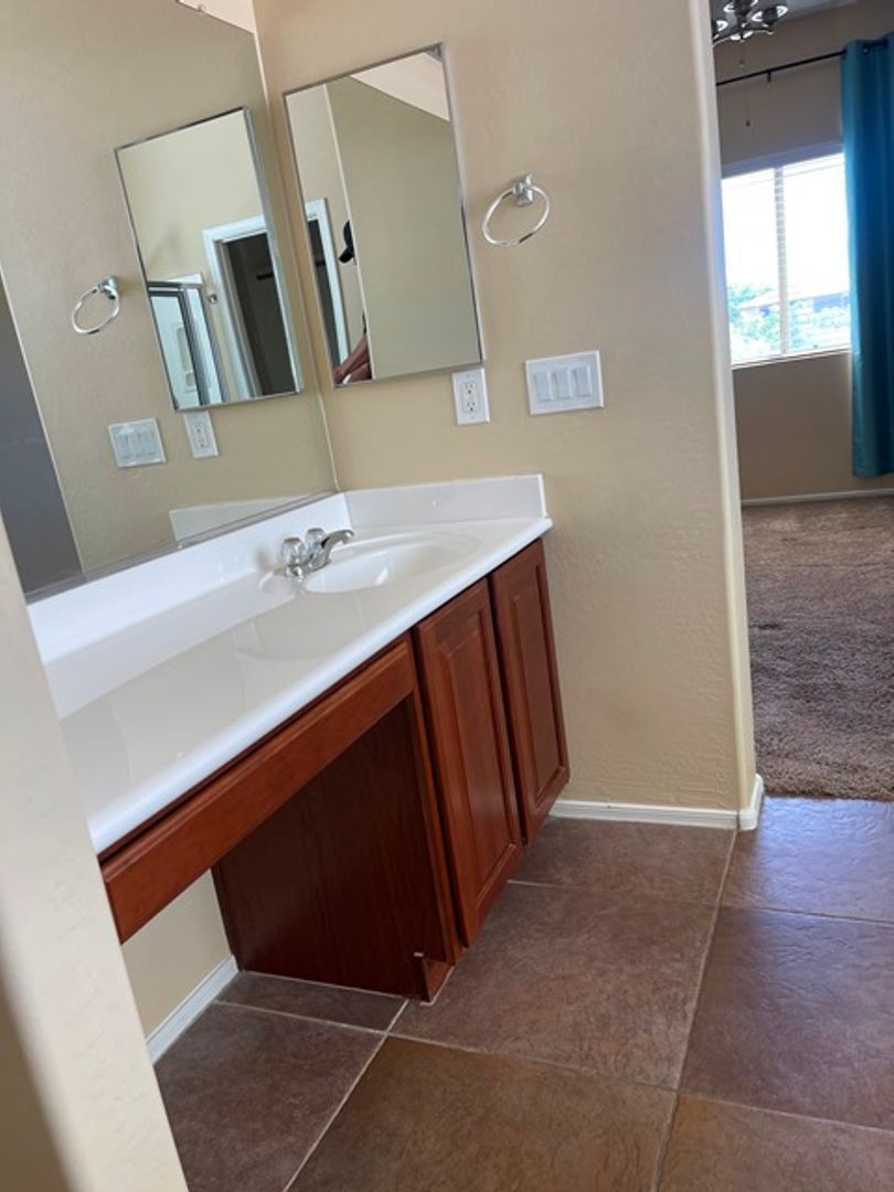 3 bedroom and 2 1/2 bath home with a pool and spa in Surprise Farms is ready for early July move in! property image