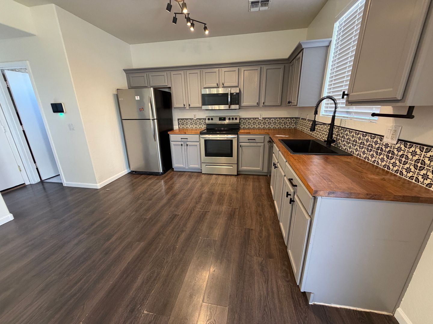 Solar-Powered 4 Bed/2.5 Bath Home with a Huge Backyard- Available NOW! property image